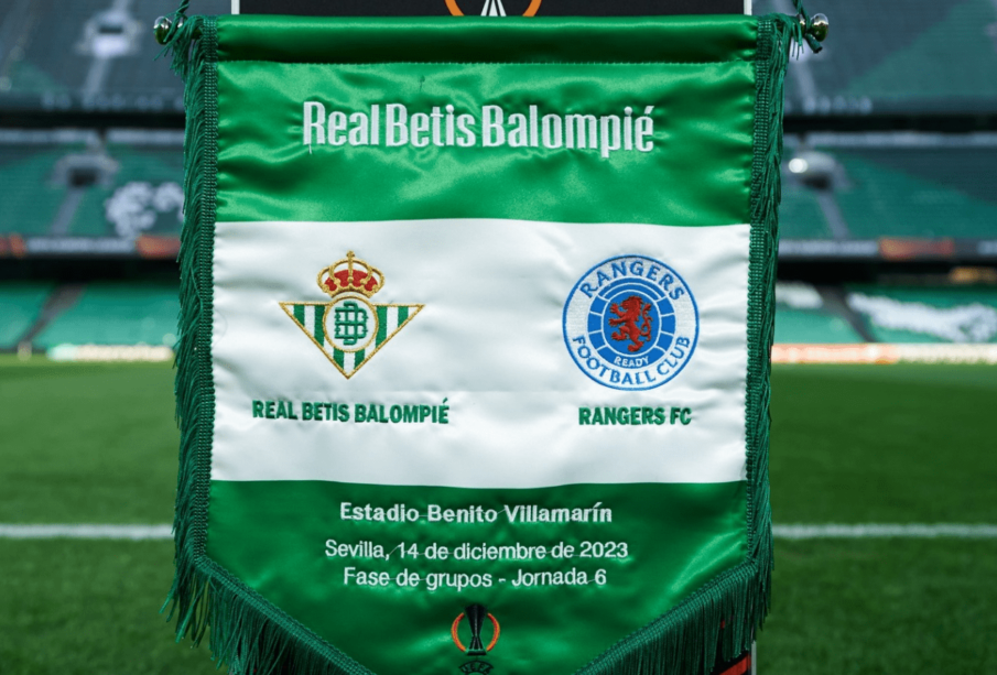 Banderín del encuentro entre el Betis y el Rangers
